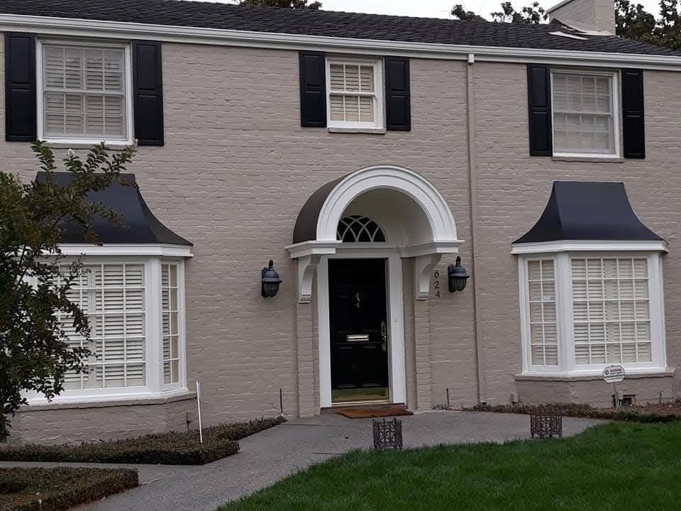 Exterior - Front entrance portico and black door painting